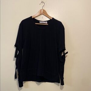 WILT BLACK COTTON SWEATER TOP WITH CUT OFF ON SLEEVE. Size M. Made in USA